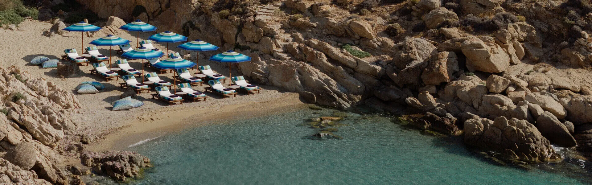 Missoni Beach Resort: Exclusive beach area at Cali Mykonos, perfect for luxury day experiences.