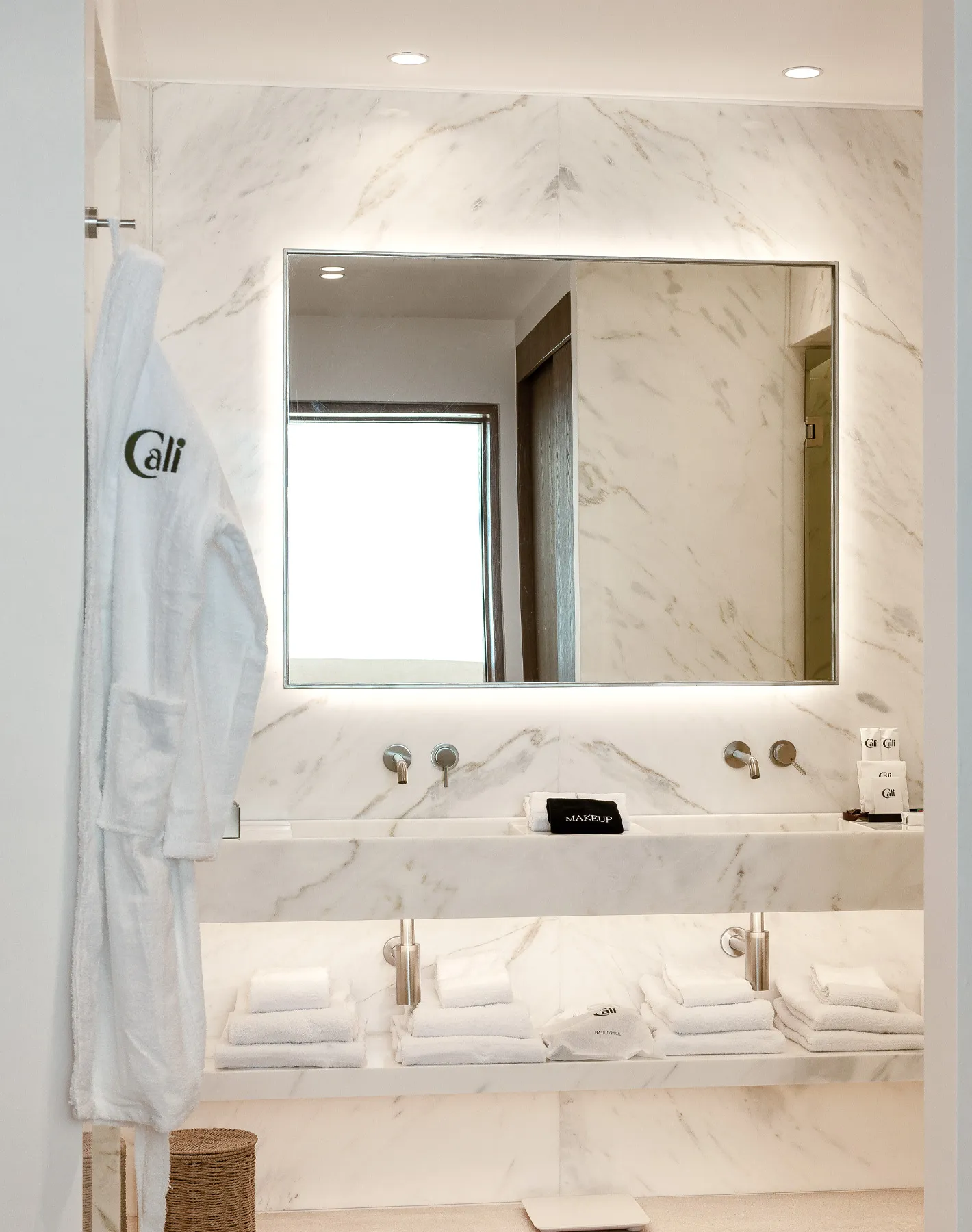 Indulge in the opulent bathroom amenities at Villa Calliope, featuring high-end toiletries, plush towels, and elegant marble finishes, providing a spa-like experience in the comfort of your villa.
