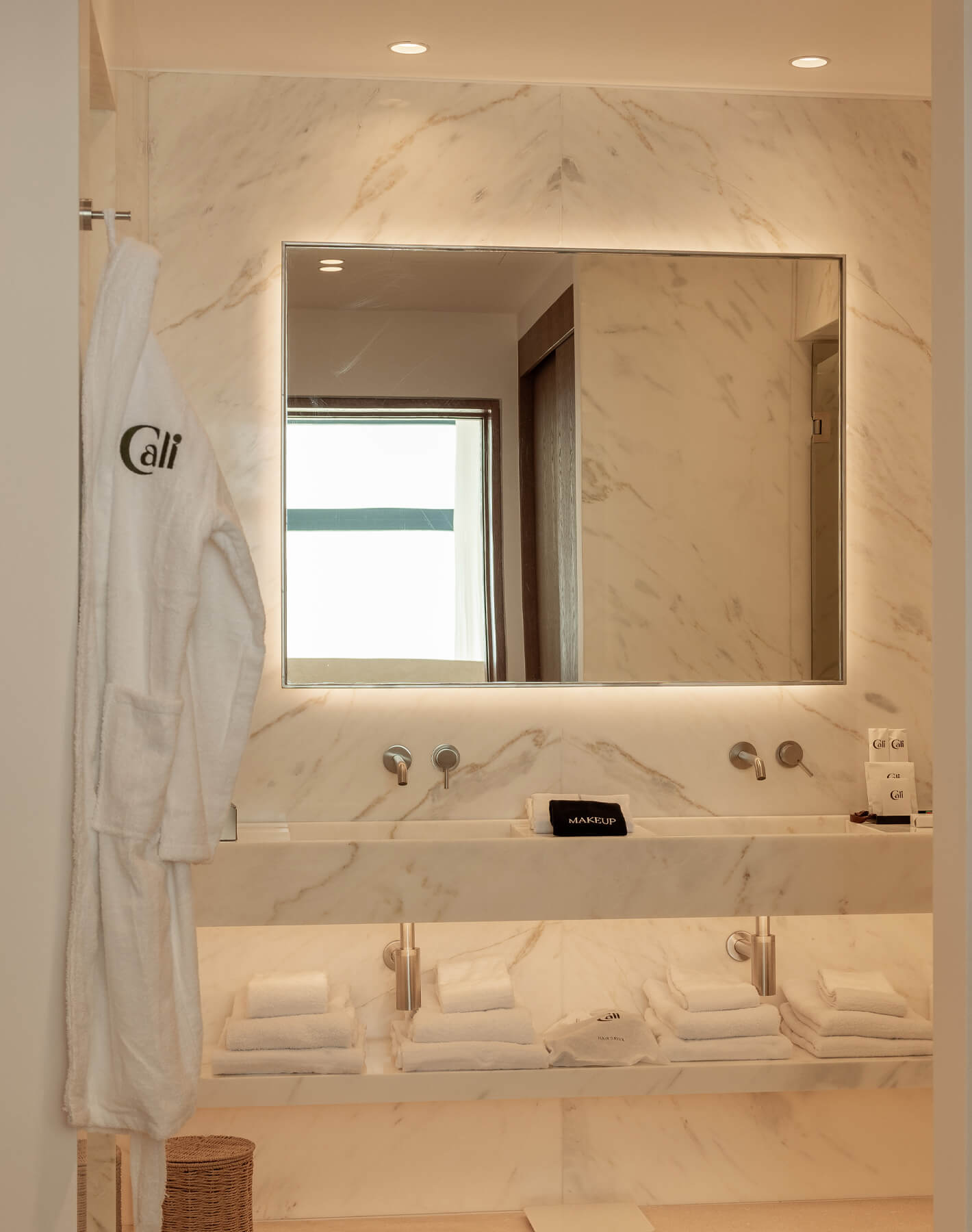Indulge in the opulent bathroom amenities at Villa Calliope, featuring high-end toiletries, plush towels, and elegant marble finishes, providing a spa-like experience in the comfort of your villa.