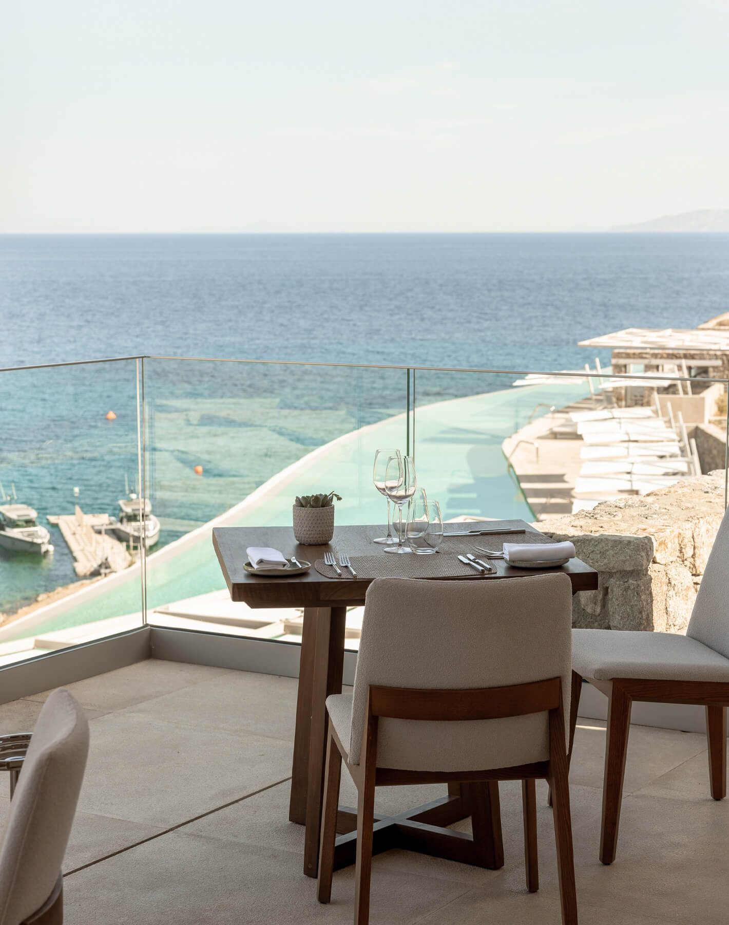 Breathtaking view from Cali's restaurant. View of the Greek Aegean Sea and Mykonos' longest infinity pool.