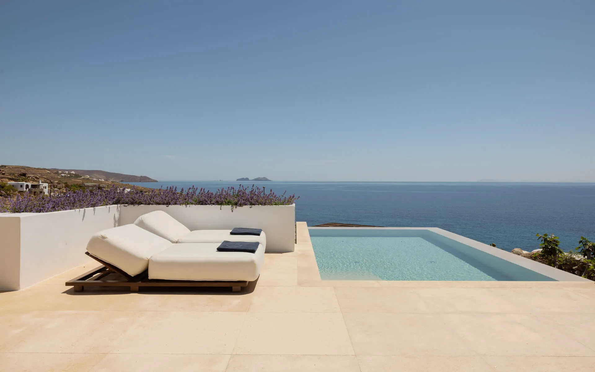 Enjoy breathtaking views from the terrace of the Cali Suite, overlooking the sparkling pool and lush surroundings. It's the ideal setting for a tranquil retreat in paradise.