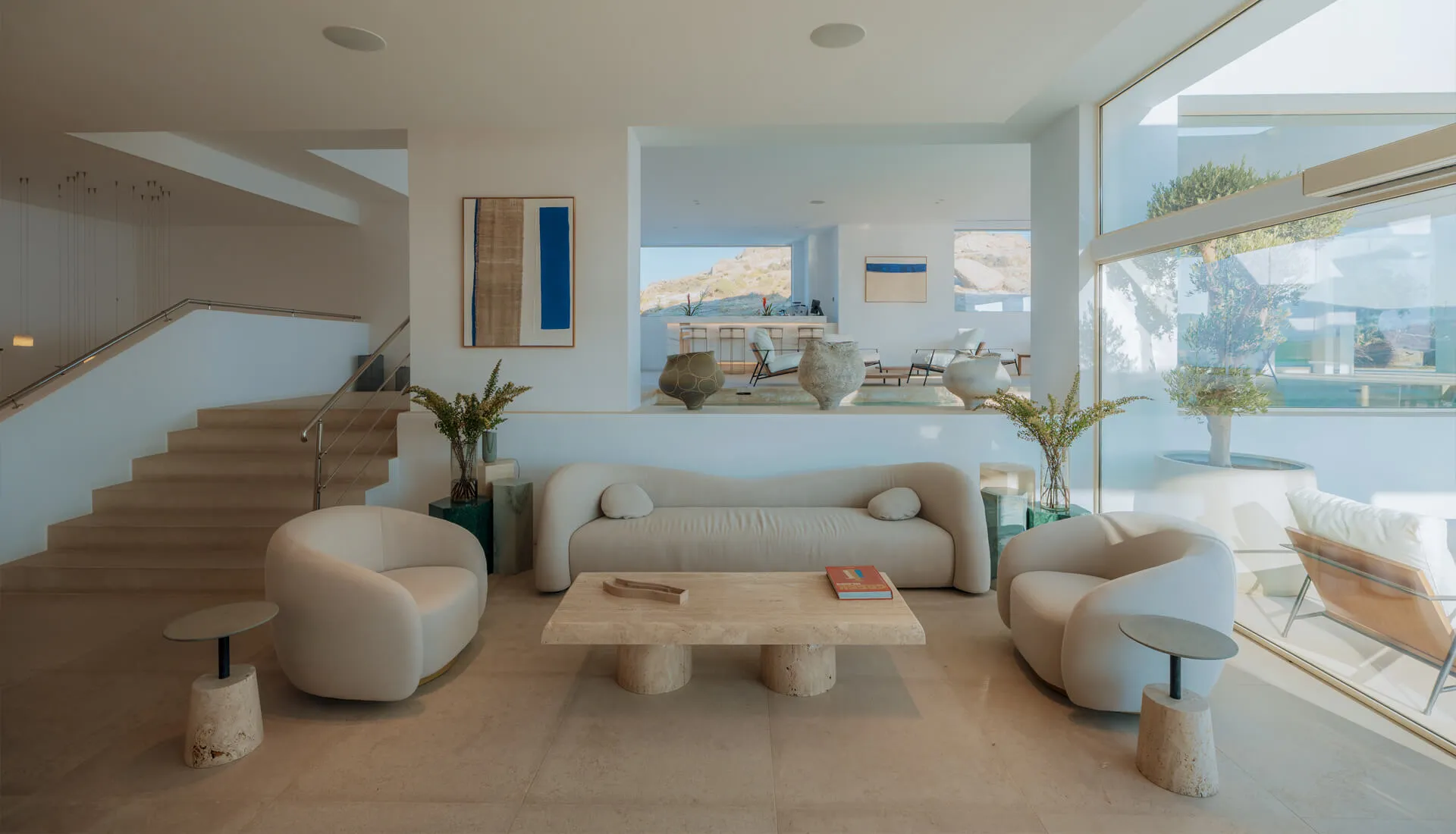 Elegant lobby reception at Cali Mykonos, a luxury resort featuring stylish design, welcoming ambiance, and personalized guest service.